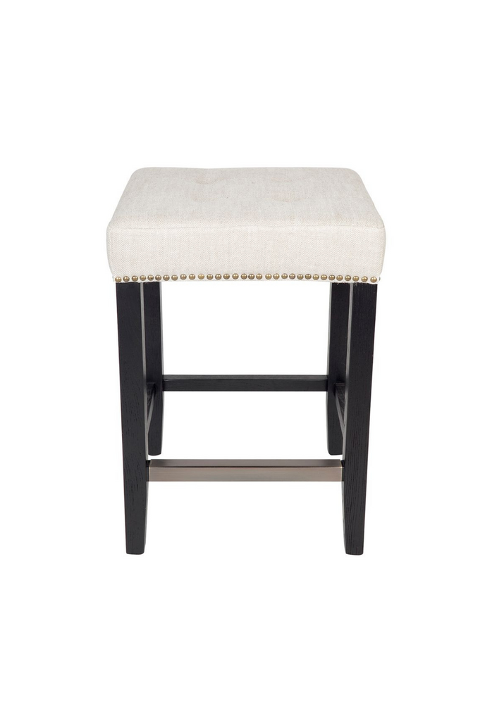 Black Kitchen Stool with Natural Linen Seat Cushion and Brass Stud Detailing on a white background