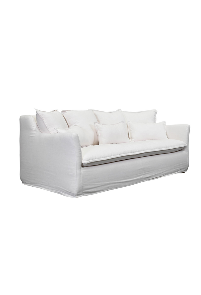 White sofa with 7 cushions included