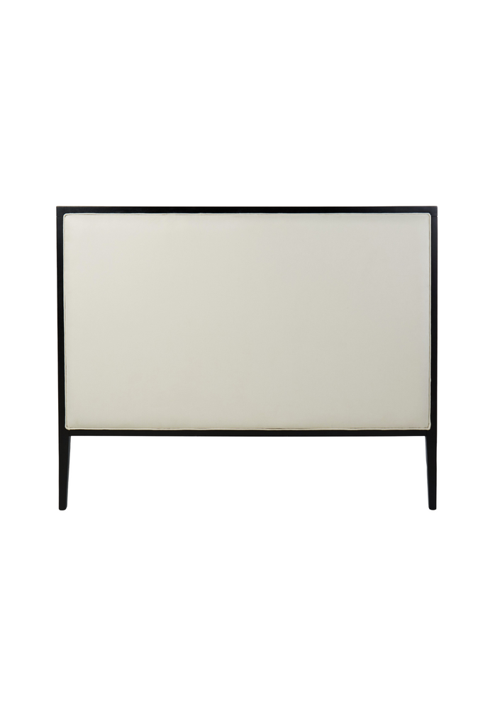 Monochrome Bedhead with a Black Wooden Frame and White Upholstered Inside on White Background