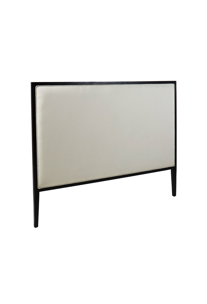 Monochrome Bedhead with a Black Wooden Frame and White Upholstered Inside on White Background