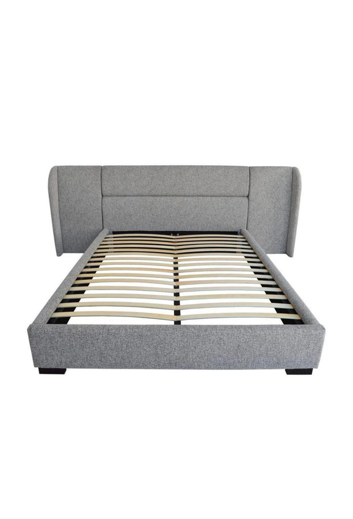 Modern Bed fully upholstered in textured grey fabric with a padded head board featuring generous wings extending out to the side