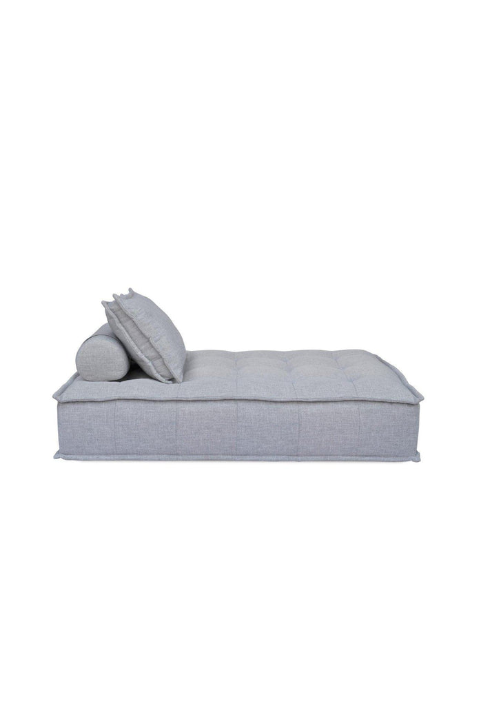 Rectangular Double lounger with button tufting fully upholstered in a textured grey fabric with matching cushion on a white background