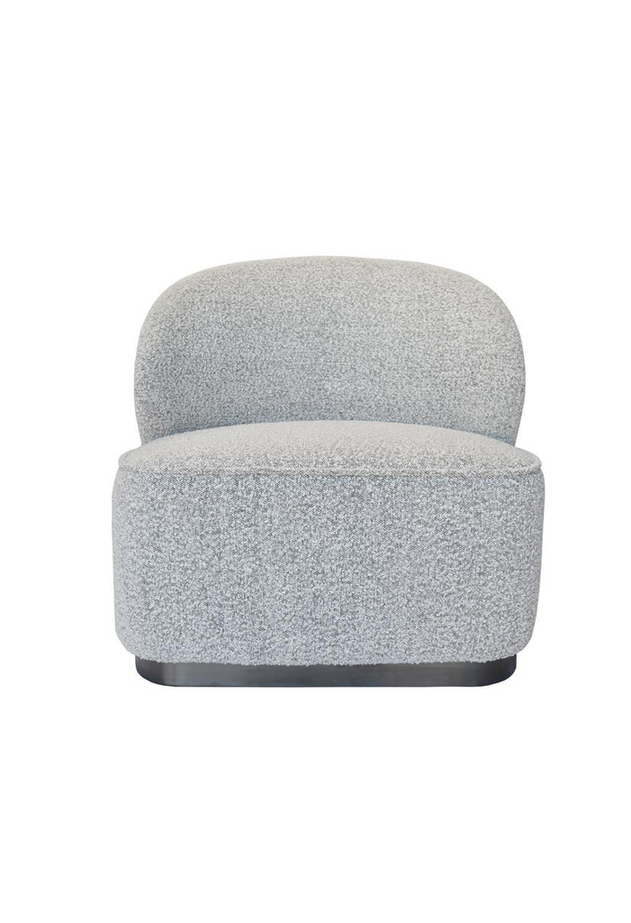 Chunky armless chair with curved back rest fully upholstered in charcoal grey boucle with a solid charocoal coloured metal base