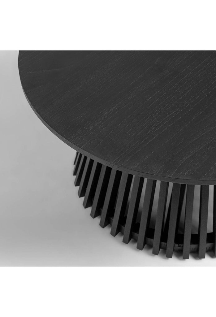 Black wooden round coffee table with a unique base created with black wooden panels placed one by one in a round shape on a white background