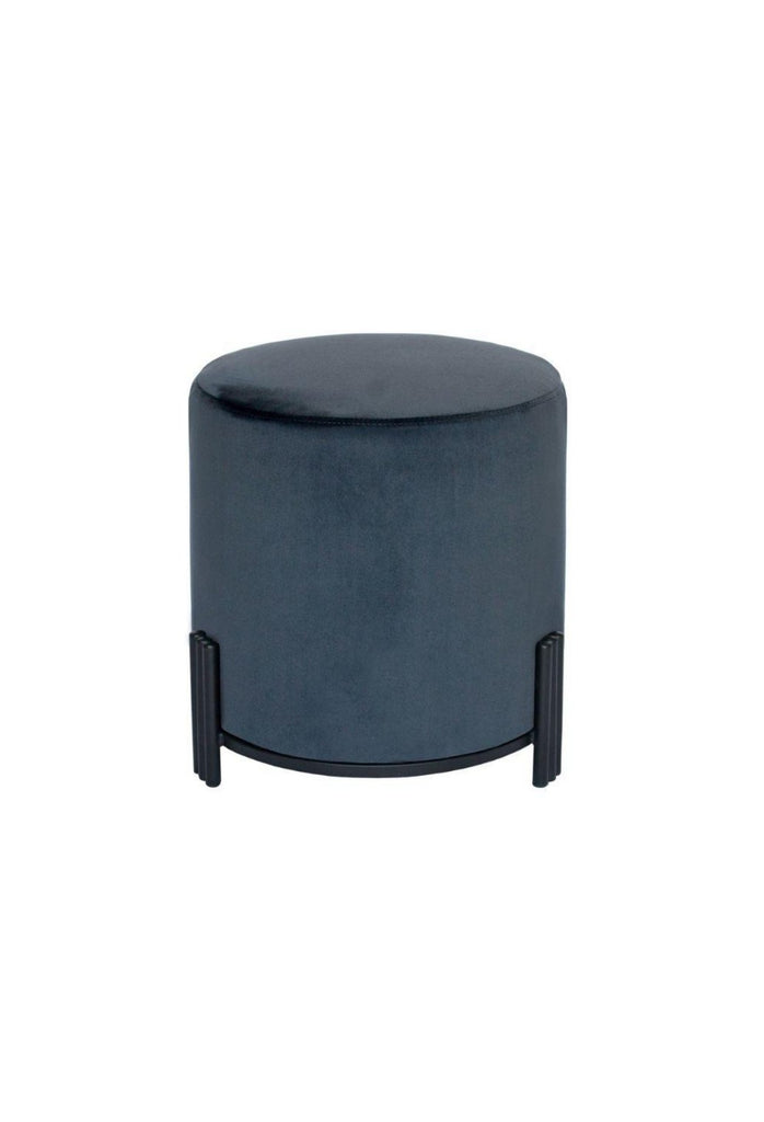 Round Ottoman upholstered in charcoal velvet with matte black metal base and three ribbed legs on white background