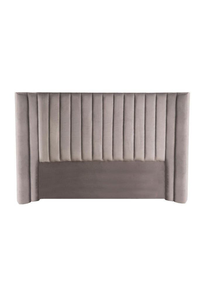 Plush Panelled Bedhead with Curved Sides Fully Upholstered in Taupe Grey Velvet on a White Background