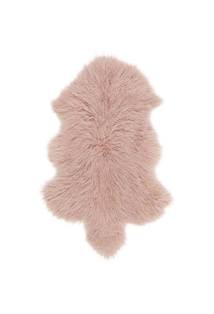 Mongolian Sheepskin in its natural shape and with its unique long hair in blush pink on white background