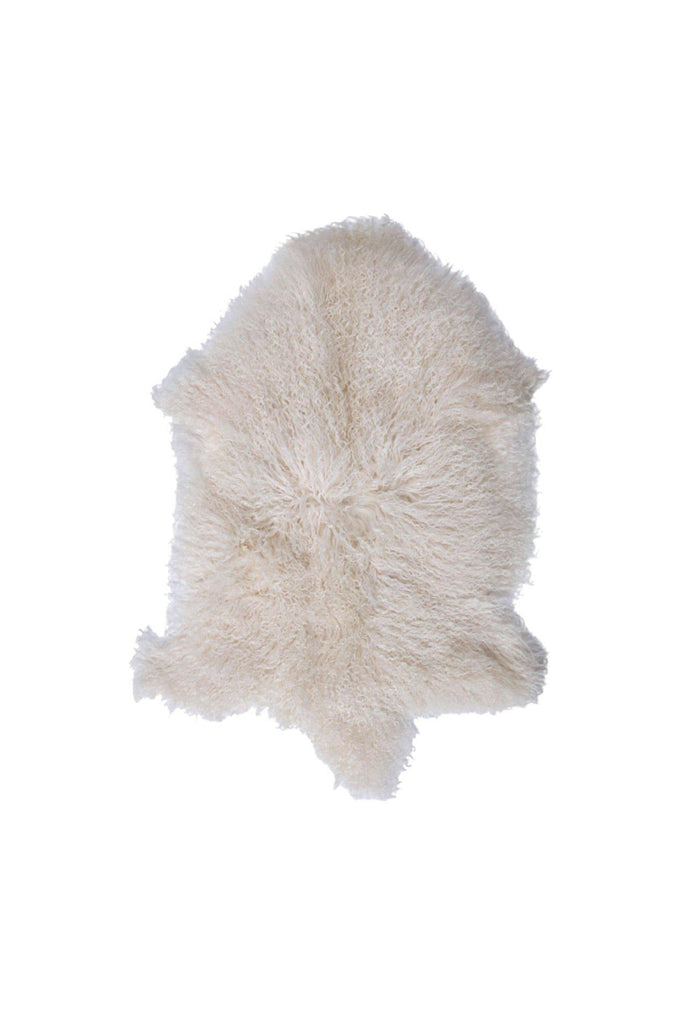 Mongolian Sheepskin in its natural shape and in a natural white colour on white background