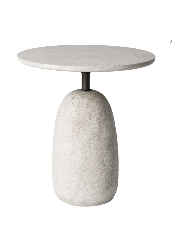 Small round outdoor table with a natural light grey stone finish and a solid round base on a white background