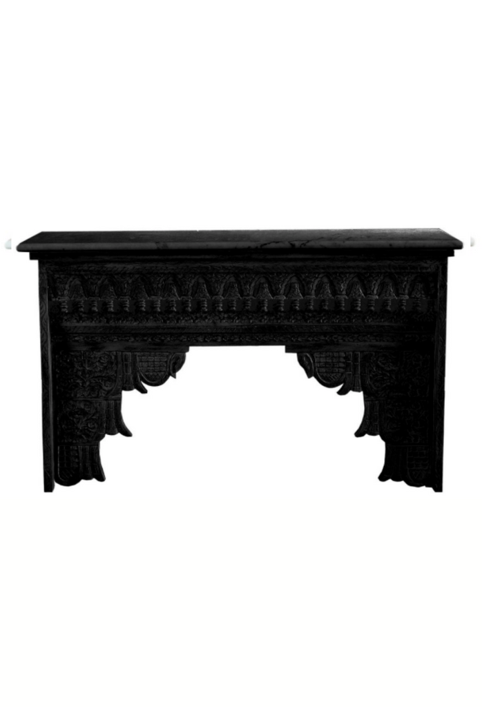 Vintage Style console table with various carvings and ornaments on base on a white background
