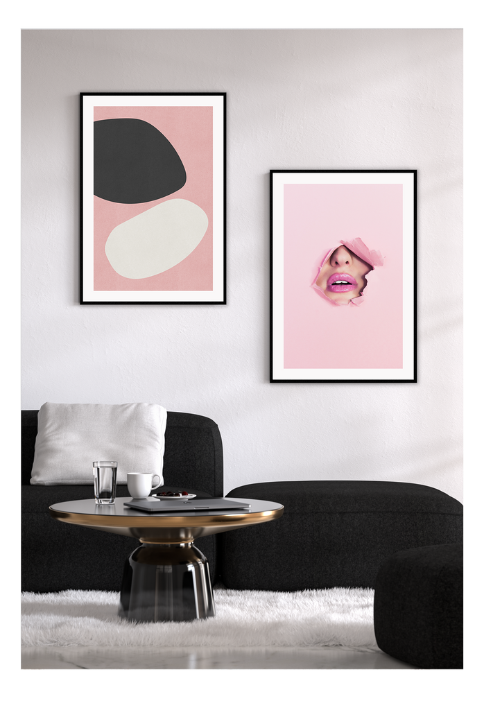 A pink wall art with fashion model face and pink lips. 