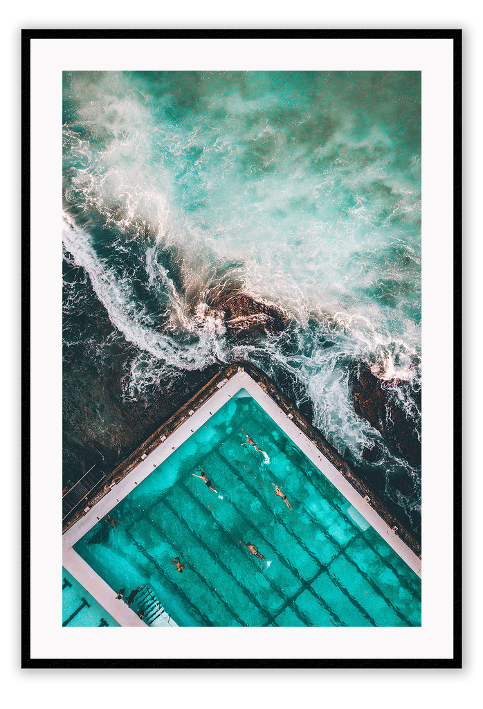 An ocean wall art with a blue and green water sea with famous iceberg swimming pool in Bondi, Sydney, Australia