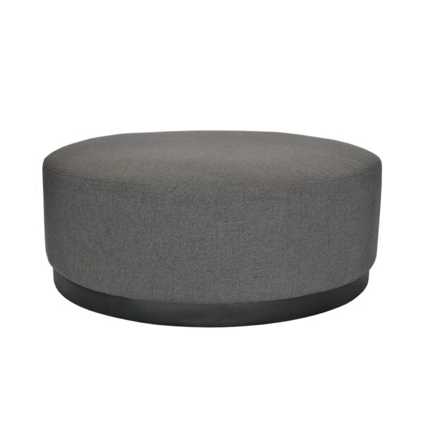 Large round ottoman fully upholstered in a dark grey textured fabric with a black powder-coated metal base