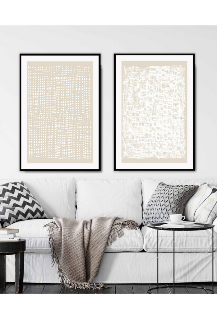 Modern abstract print with small white squares in random formation creating an irregular grid on beige background.