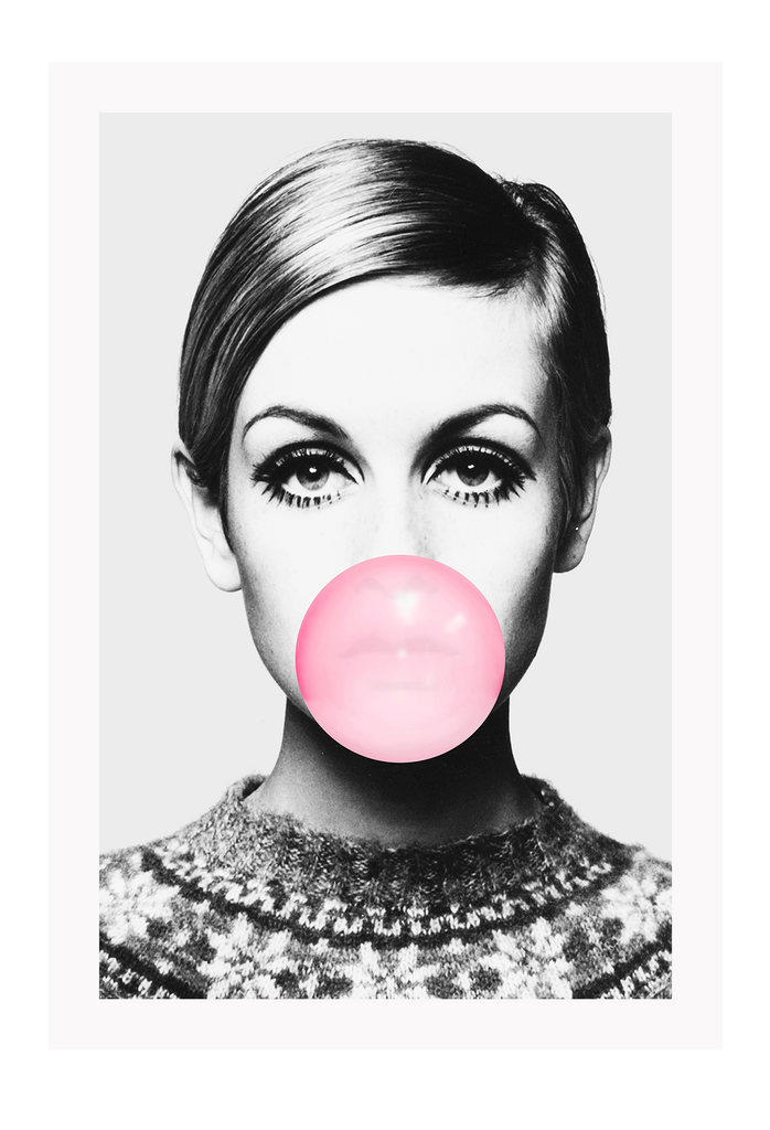 A fashion, photographic wall art of 60s 70s female model Twiggy with big eyes, long lashes and pink bubble gum