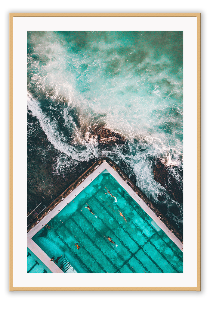 An ocean wall art with a blue and green water sea with famous iceberg swimming pool in Bondi, Sydney, Australia