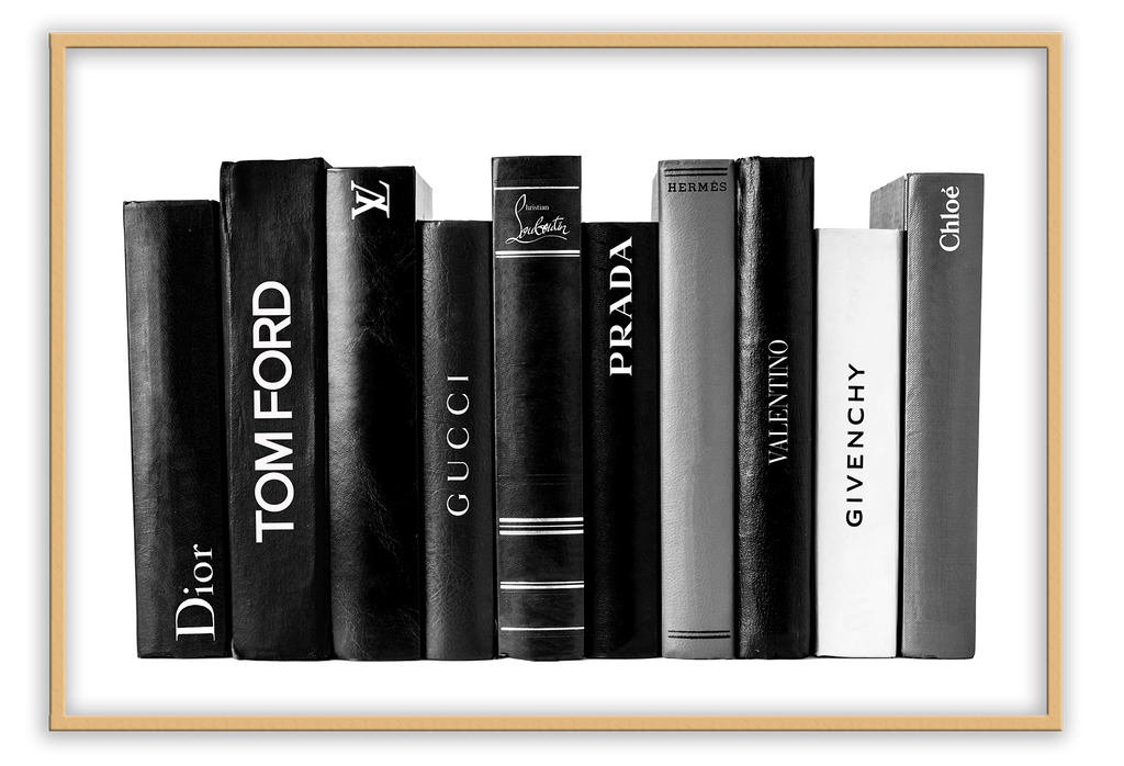 A black and white fashion bookshelf with a brandy collection of gucci, tom ford, givenchi, chanel,  valentino, dior.