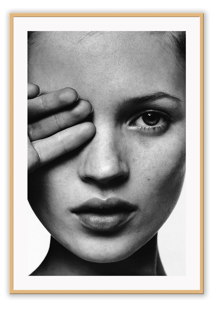 An iconic fashion wall art with 90s English model Kate Moss in black and white. 
