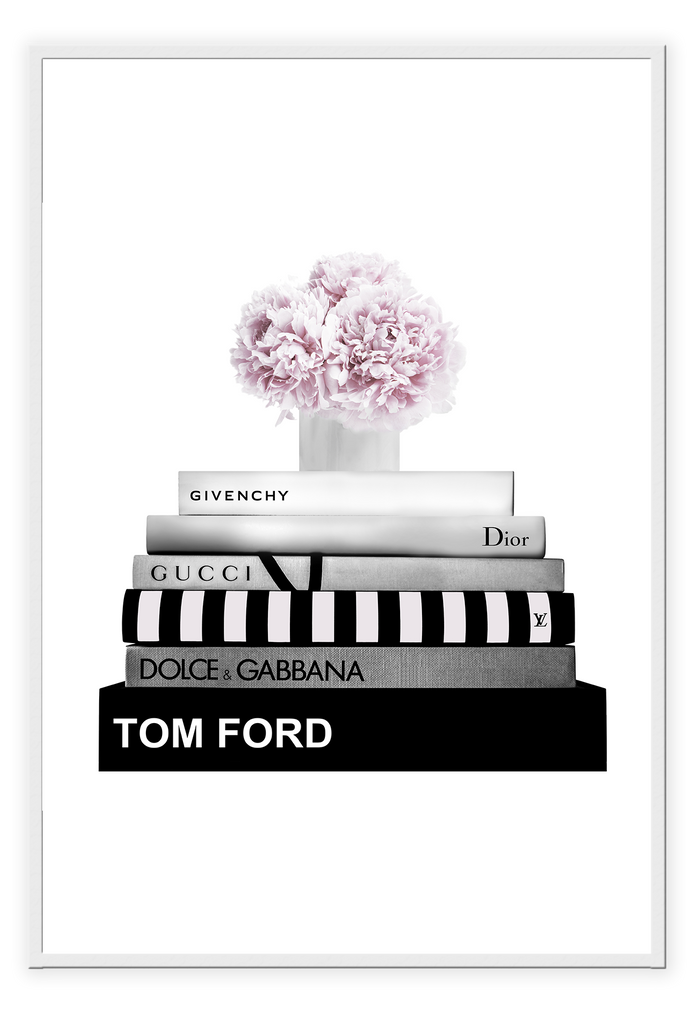 Fashion print black and white fashion books stacked pink  flowers on top givenchy gucci tom ford dolce dior  