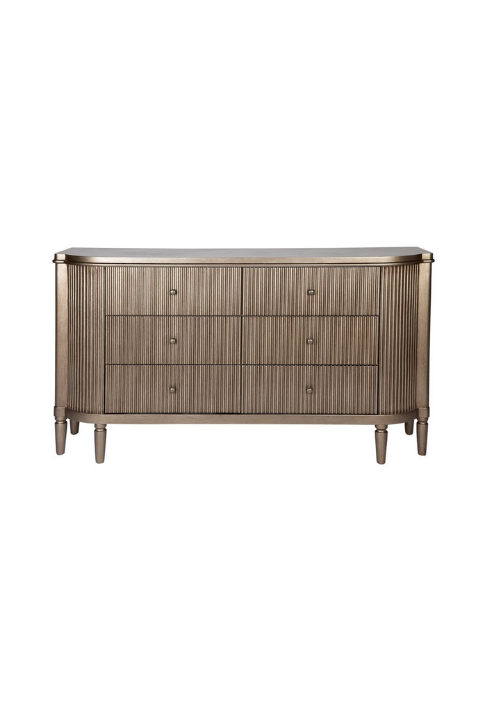 Art Deco Style Chest of Drawers in Brushed Antique Gold Finish with 6 drawers and fluted front on a white background