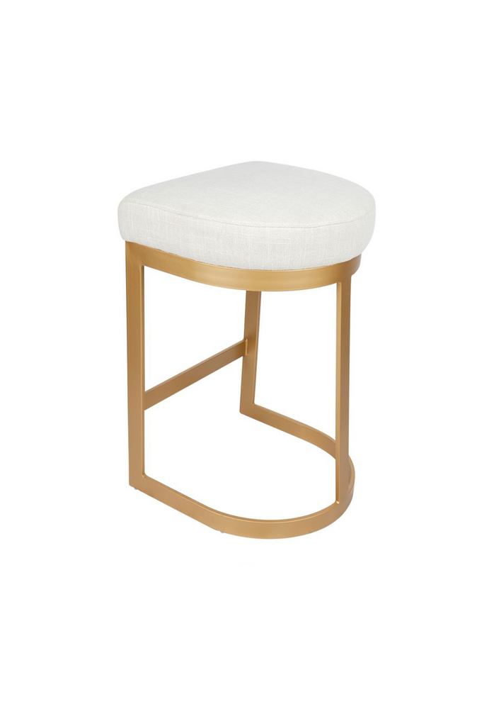 Modern brass coloured bar stool with steel base in round and edgy geometric shapes and a natural linen seat cushion