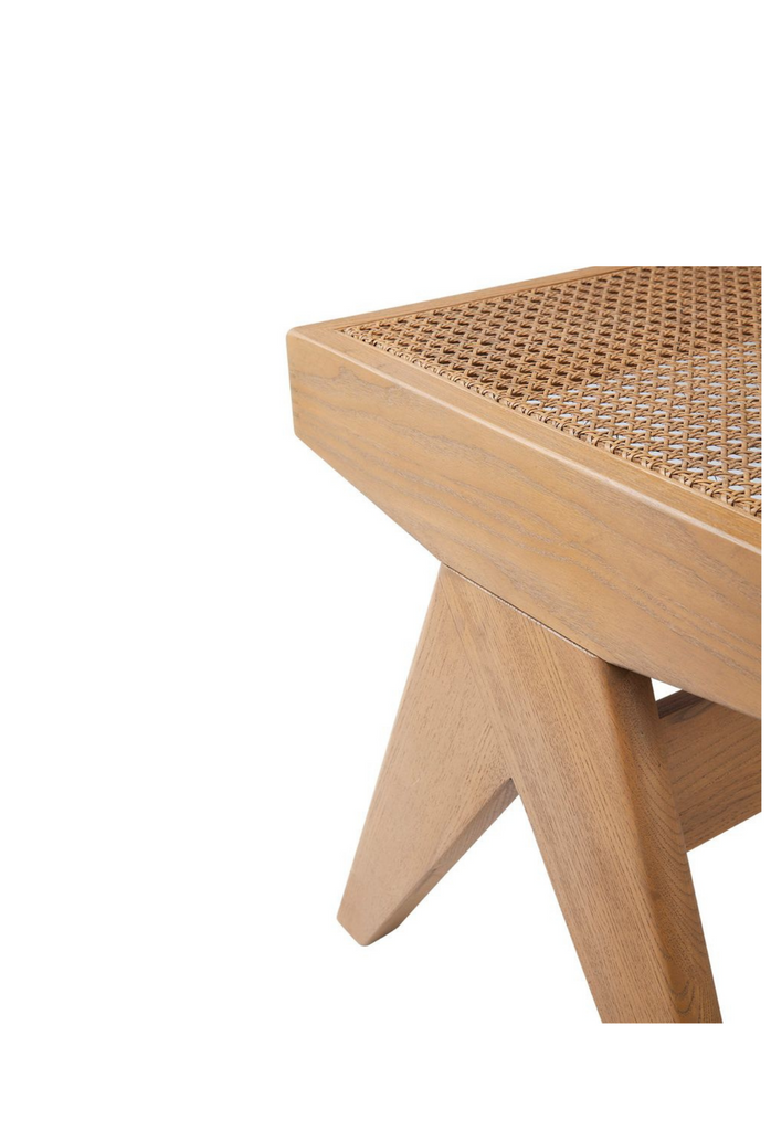 Simplistic Bench Ottoman with sturdy natural timber legs and a natural coloured rattan top / seat on a white background