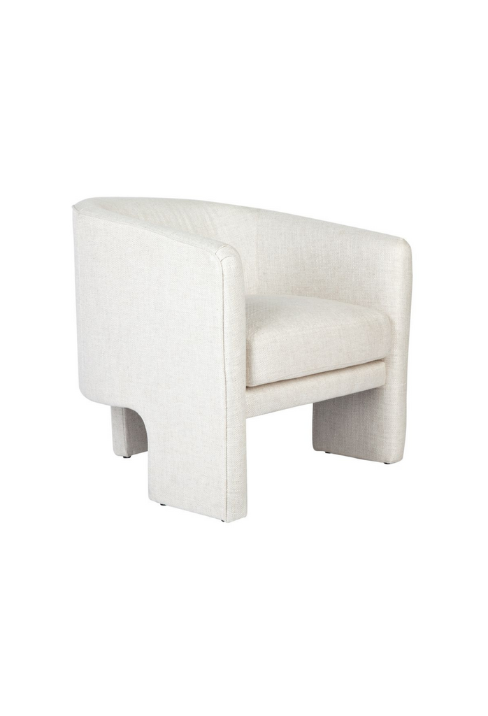 Modern armchair with a curved back rest and tripod legs fully upholstered in natural ivory linen on white background