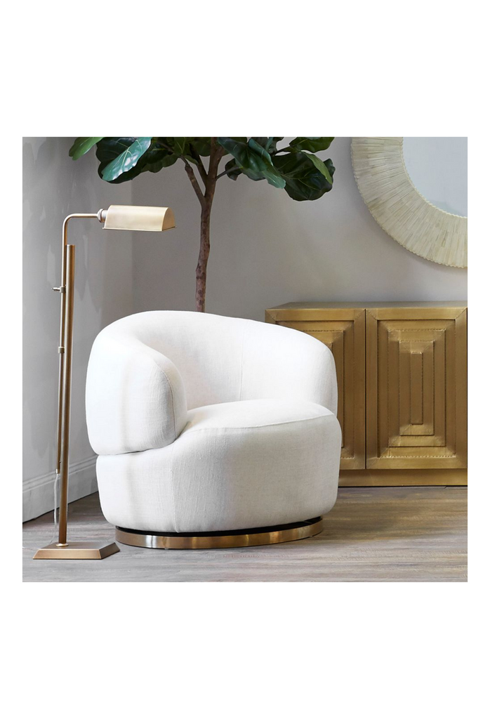 Natural Cream Linen Swivel Armchair with a chunky curved back rest and a gold base fully upholstered in Natural Linen