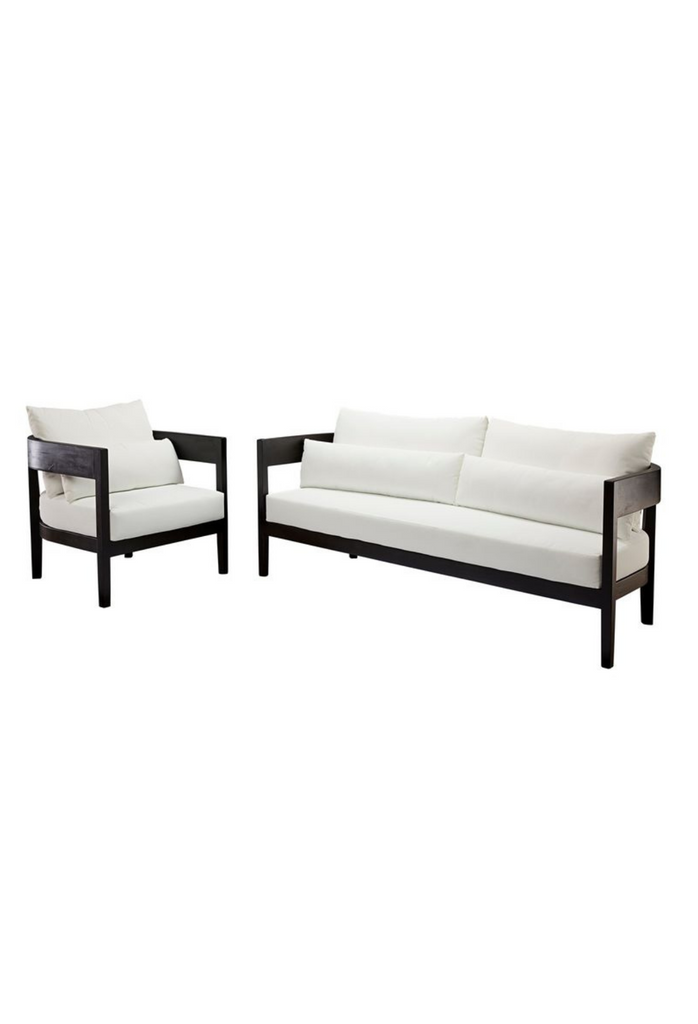Modern Black Teak Outdoor Armchair with a Sleek Curved Back Rest and White Cushions on White Background