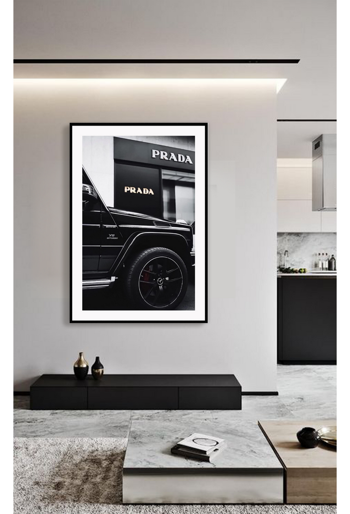 Fashion black and white photography print of a black Mercedes G Wagon in front of a Prada store.