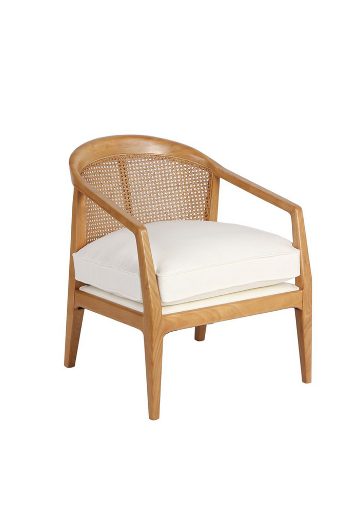 Natural timber occasional armchair with a curved back rest featuring rattan detailing and a white linen seat cushion