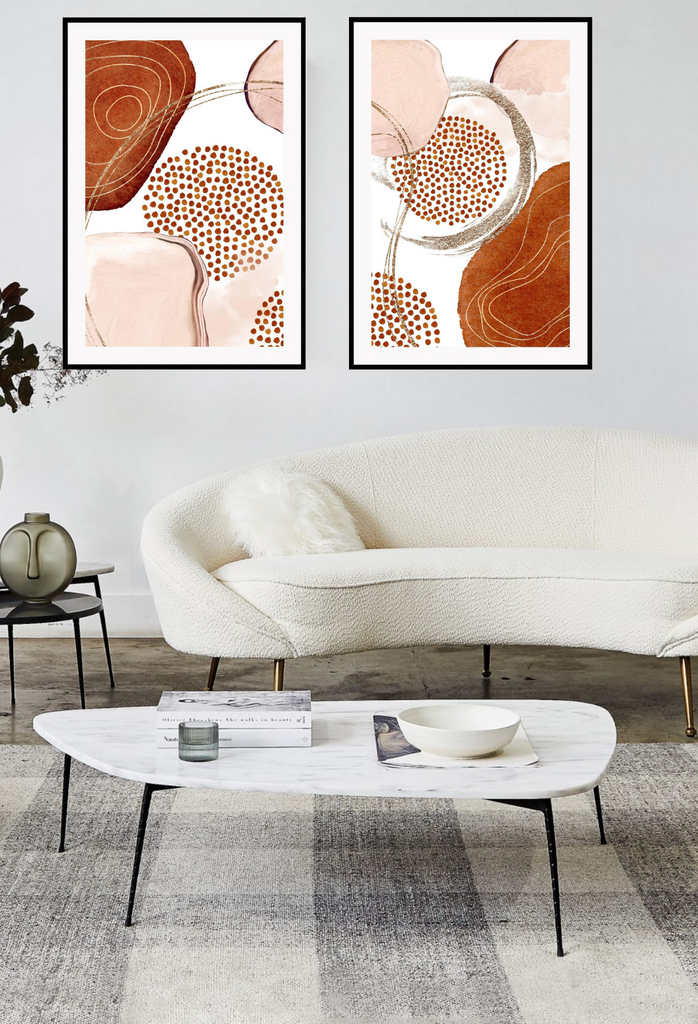 Abstract art print featuring peach and rust watercolour shapes connected with gold flecked lines on a white background.