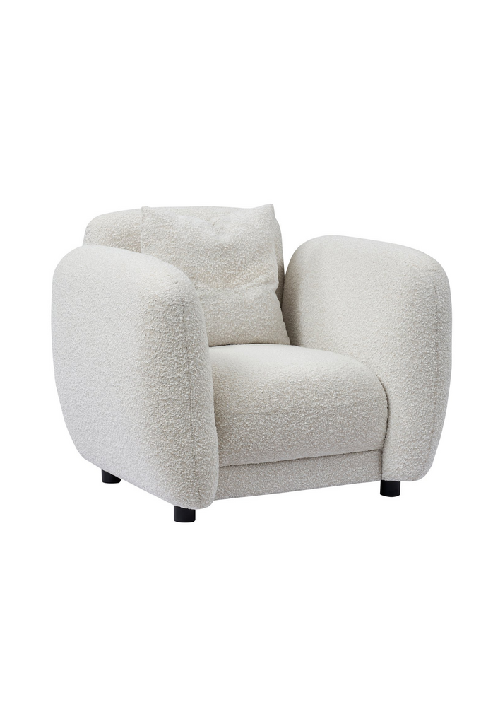 Chunky Armchair with generous back and arm rests fully upholstered in white boucle with matching cushion and round matte black feet