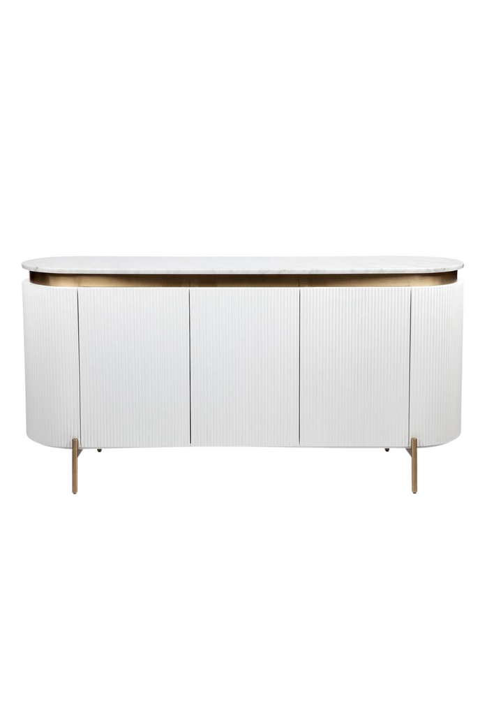 Glamorous white ribbed buffet with marble top and gold legs