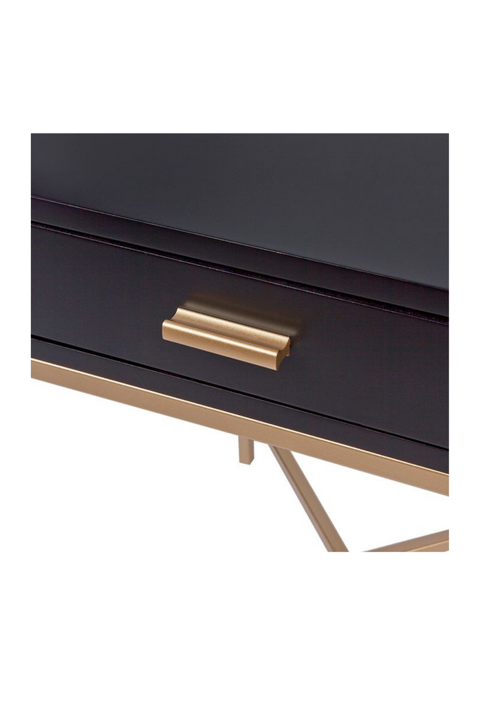 Sleek Bedside Table With a Black Top and Drawer Featuring a Gold Metal Frame and Handle on White Background