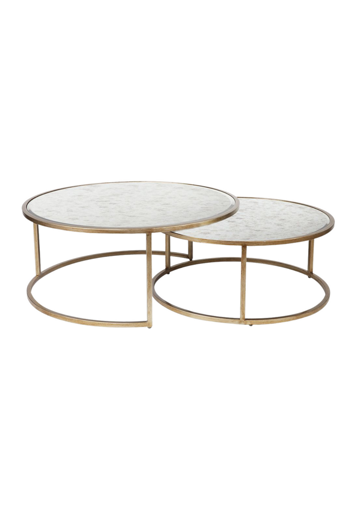Set of Two Nesting Round Coffee Tables with Inlaid Antique Mirror Table Tops and a Sleek Antique Gold Metal Frame