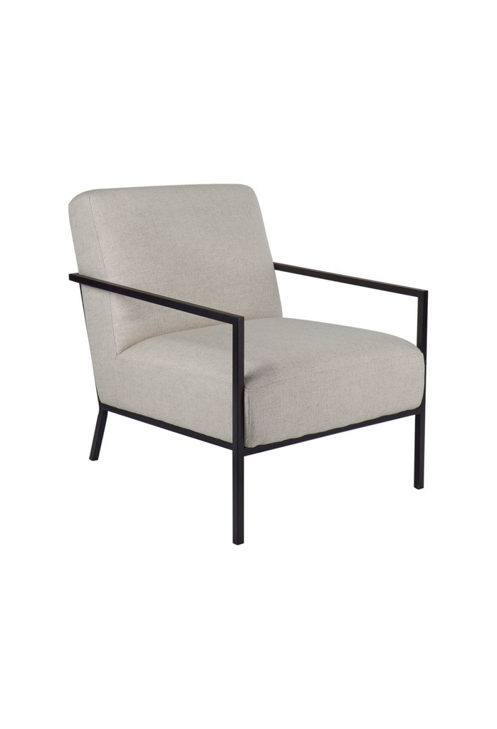 Minimalistic Armchair with a thin matte black metal frame in straight lines and arm and back rest upholstered in natural coloured linen