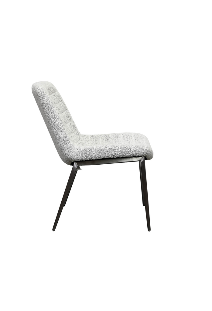 Armless Occassional Chair with Generous Seat Fully Upholstered in Black and White Boucle Featuring Horizontal Stitch Detailing and Black Metal Legs
