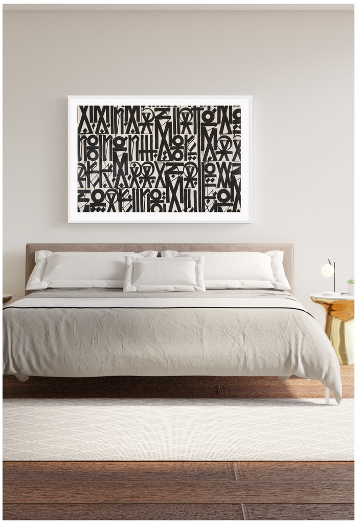 Modern abstract print with black dripping circles, triangles and lines in a random order on a plain beige background.