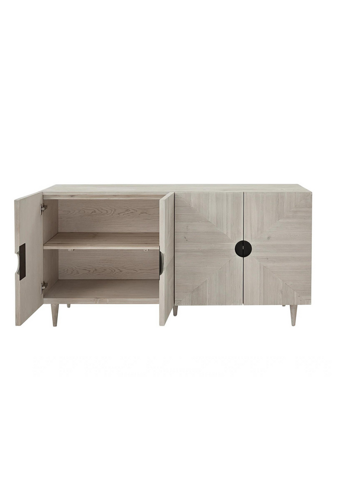 Rectangular Sideboard with four doors featuring geometric carvings and cut out handles in white wash finish pine wood on white background