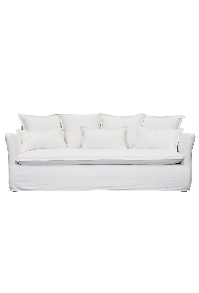 White sofa with 7 cushions included