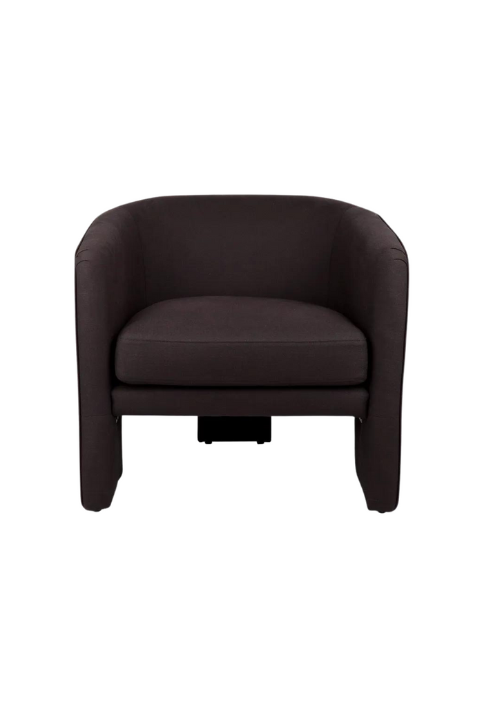 Modern armchair with a curved back rest and tripod legs fully upholstered in black linen on white background