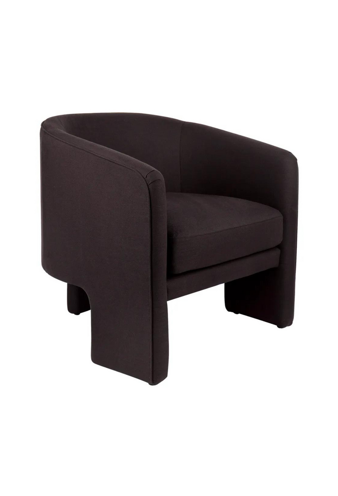Modern armchair with a curved back rest and tripod legs fully upholstered in black linen on white background