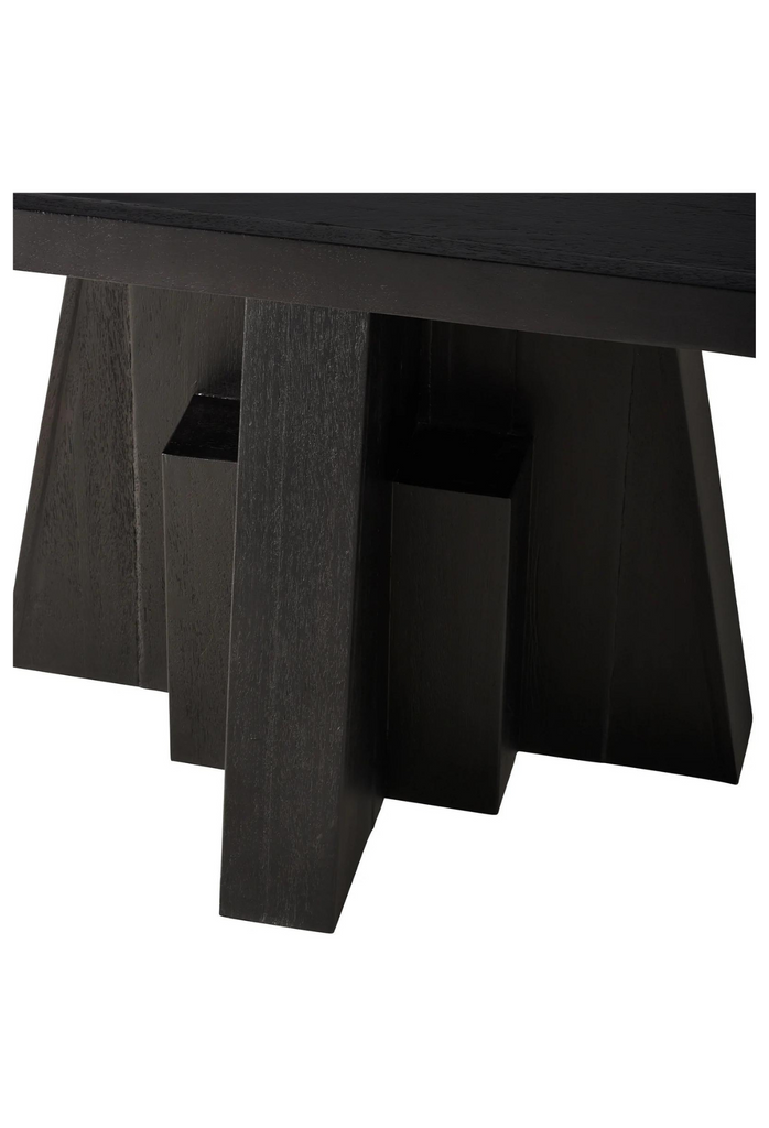 Black Mango Wood Dining Table with Large Rectangular Top and a sculptural geometric shaped base on white background