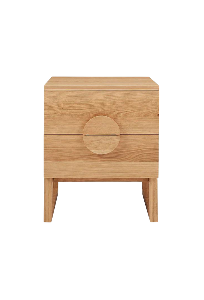 Cubic Natural Timber Bedside Table with two drawers featuring halfmoon shaped timber handles and timber legs