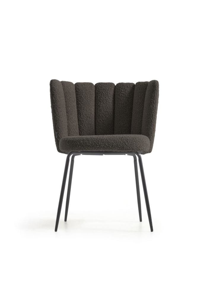 Black boucle dining chair with tubular back design