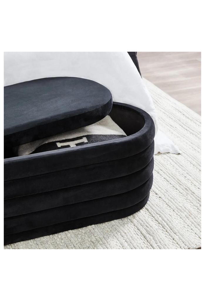 Oval Shaped Ottoman Bench Featuring Several Curved Layers Creating Padded Ribbed Look with Black Velvet Upholstery