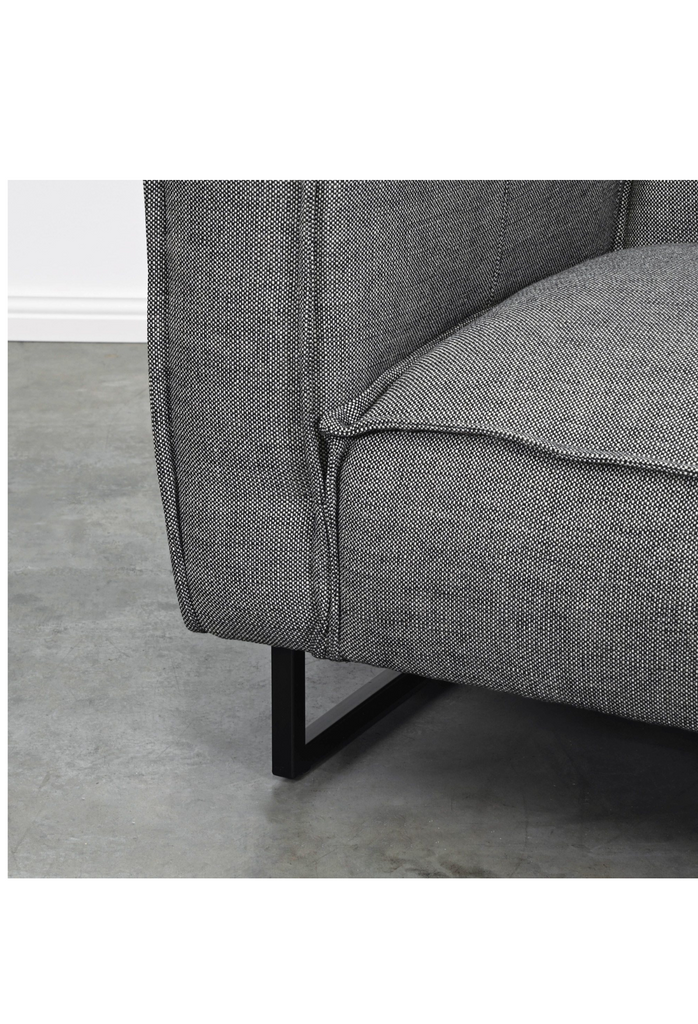 Structured modern dark grey sofa with black metal legs