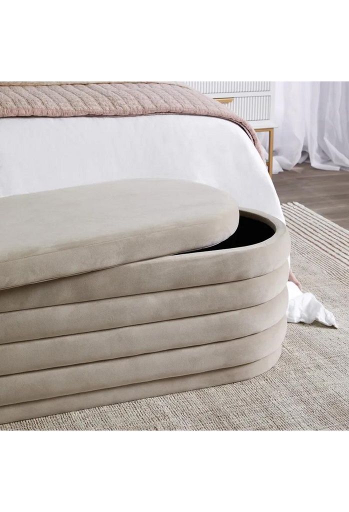 Oval Shaped Ottoman Bench Featuring Several Curved Layers Creating Padded Ribbed Look with Nude Beige Velvet