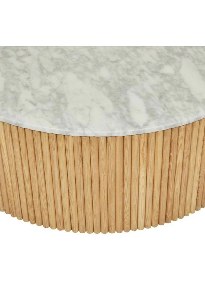 Solid Round Coffee Table with a white marble top and a natural rippled timber outside on a hidden gold metal base